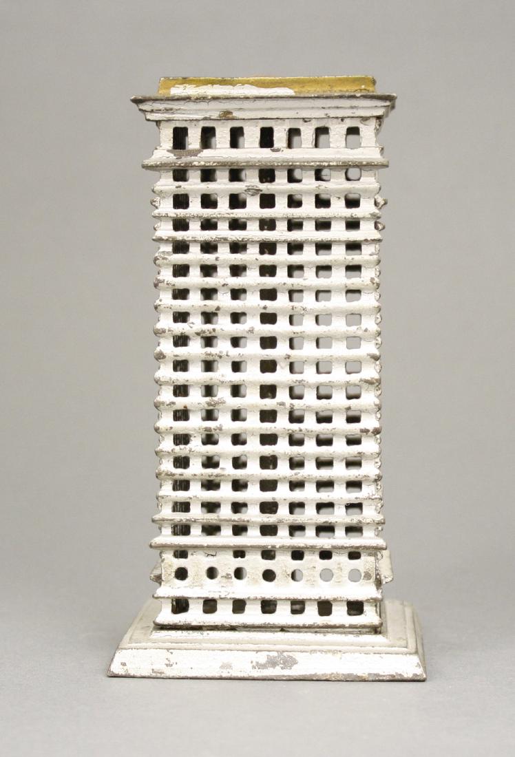 High Rise - 2nd Tallest: Kenton Hardware circa 1915. 5.75" H. An excellent condition example of this scarce bank. Made of Cast Iron. Excellent Condition.