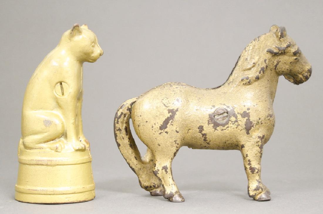 Cast Iron Beauty and Cat on Tub Still Banks: Arcade / A. C. Williams circa 1920. Made of Cast Iron. Both repainted.