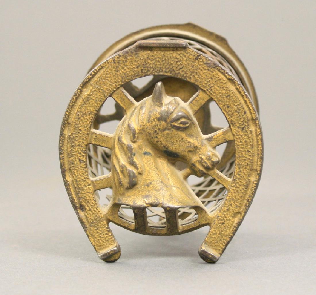 Horseshoe with Wire Mesh: Arcade circa 1920's. Made of Cast Iron. Fine Condition.