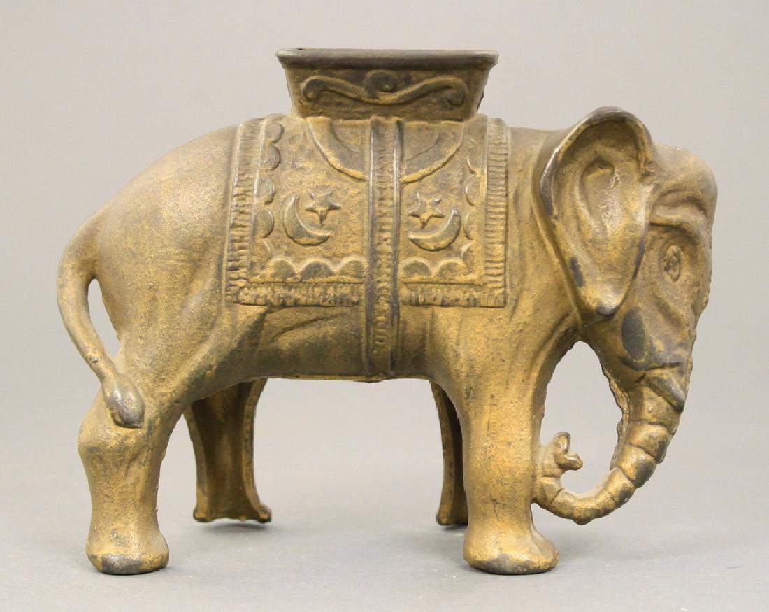 Elephant with Howdah: A. C. Williams circa 1910's. Made of Cast Iron. Good Condition.