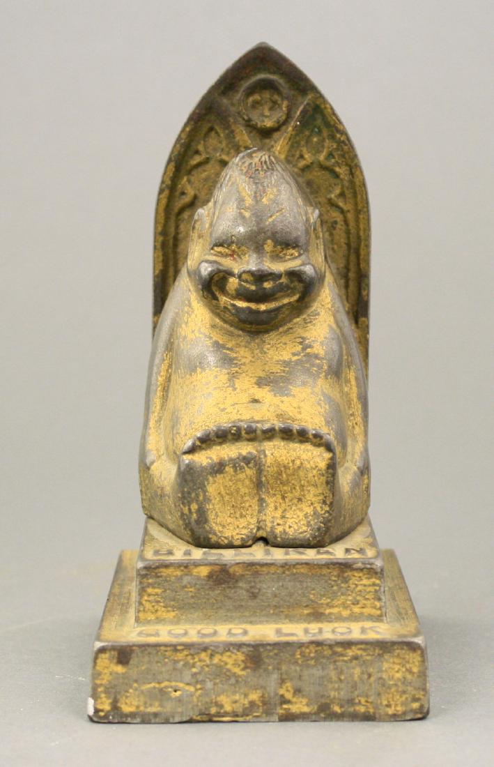 Billiken on Throne: A. C. Williams circa 1910's. Made of Cast Iron. Good Condition.
