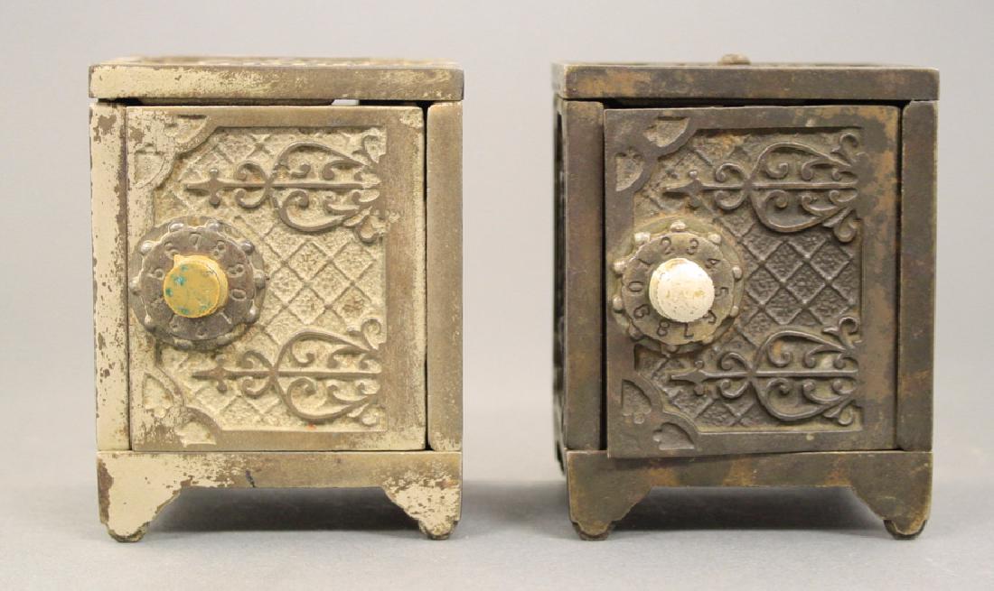 Two Savings Deposits: Kenton Hardware circa 1910's. 4" H. Good Condition.