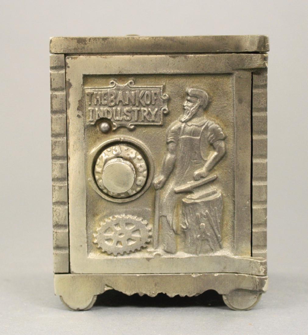The Bank of Industry: Kenton Hardware circa 1900's. 5 3/8" H. Made of Cast Iron. Very Fine Condition.