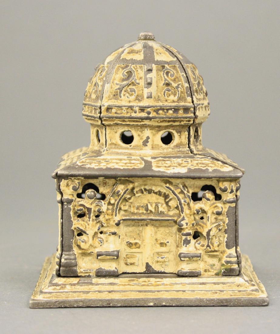 Columbia Bank: Made by Kenton Hardware circa 1900's. Made of Cast Iron. 4.5" H. Poor Condition (Replaced Twist Pin).