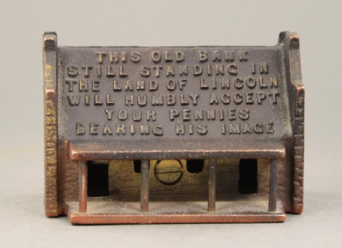 Old Shawneetown: Berg-bower circa 1970. 2 7/16" H. Made of Cast Iron. Pristine Condition.