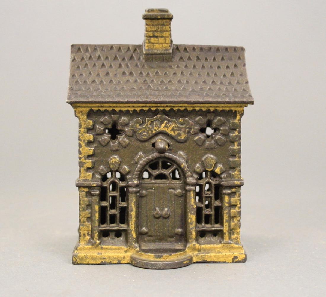 Roof Bank: Grey Iron Casting Co. circa 1900's. Made of Cast Iron. Fine Condition.