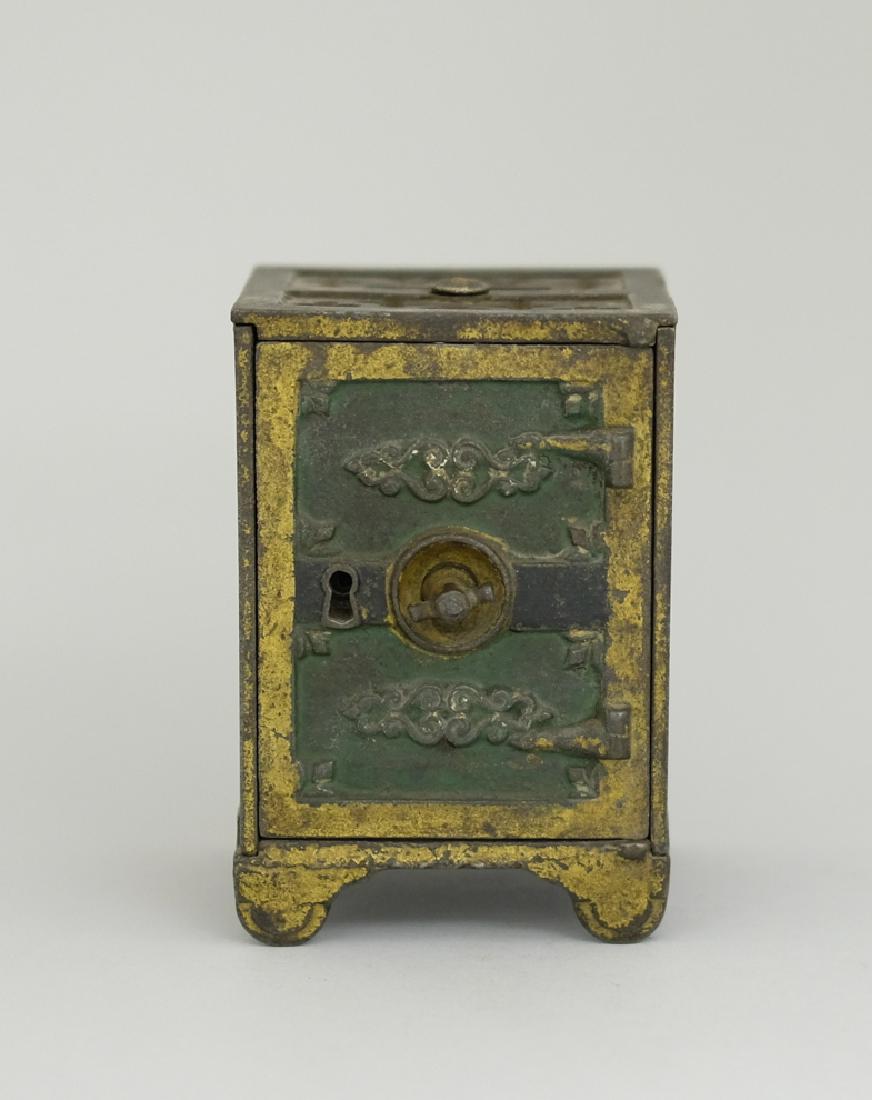 Fancy Safe: Made by Kyser & Rex. Made of Cast Iron. 4 1/4" Tall. Very Fine Condition.