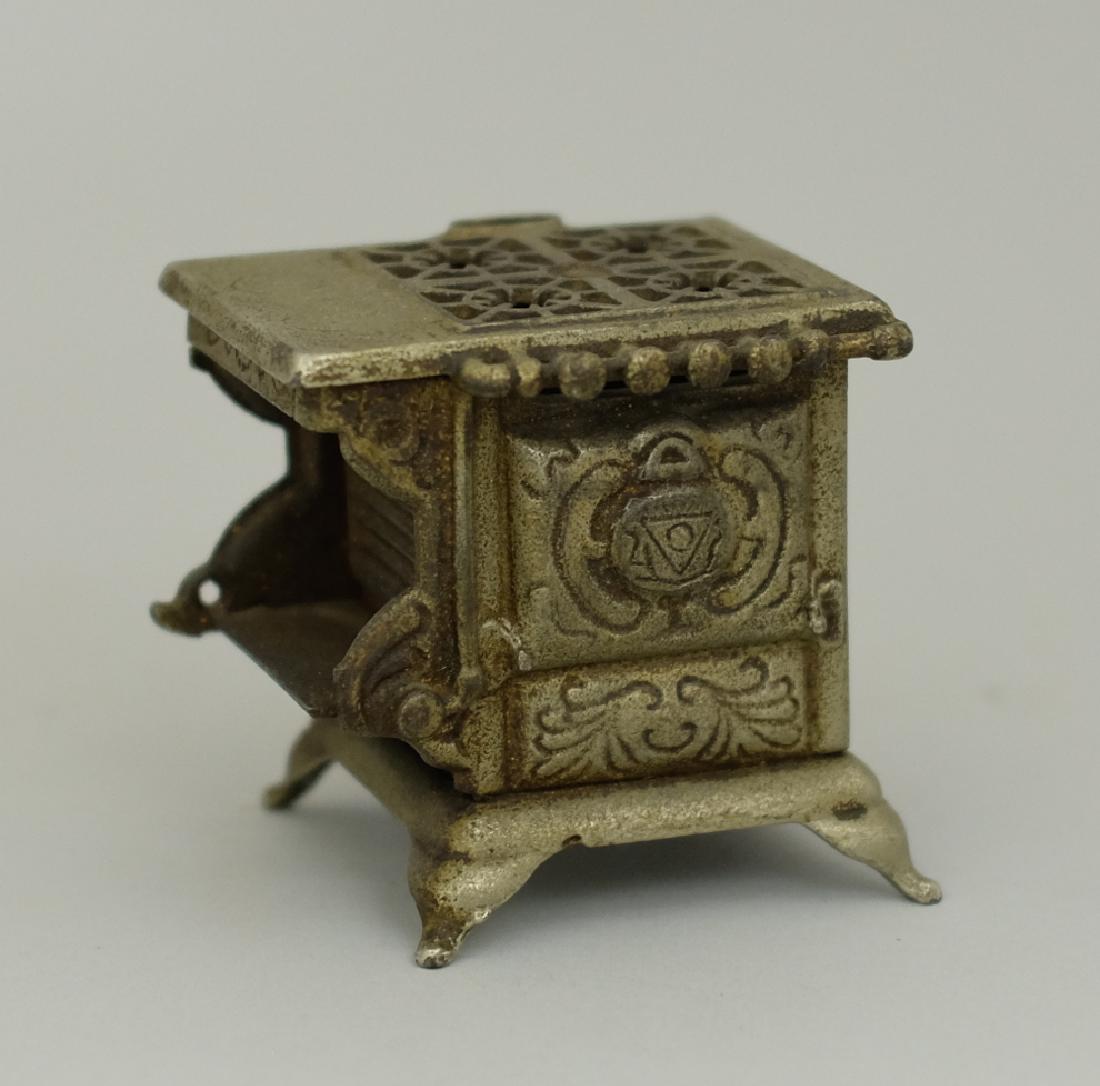Ideal Stove: Made by Ideal Mfg. Co. circa 1890's. Made of Cast Iron. Fine Overall Condition (Door broken off and missing).