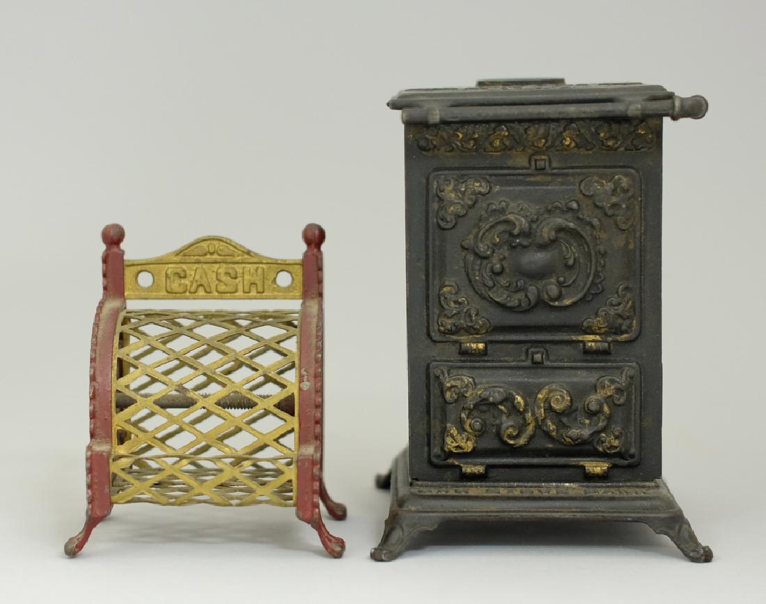 Mesh Cash Register / Gas Stove: Made by Arcade / American circa 1910's. Made of Cast Iron and Sheet Metal. 3 3/4" - 5 3/8" Tall. Very Fine to Excellent Condition.