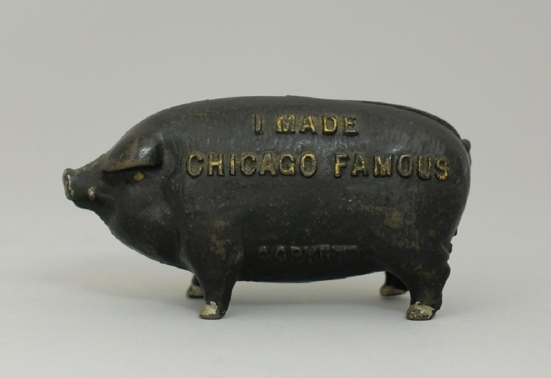 I Made Chicago Famous, Small: Made by J. M. Harper circa 1900's. Made of Cast Iron. 2" Tall. Very Fine Condition.