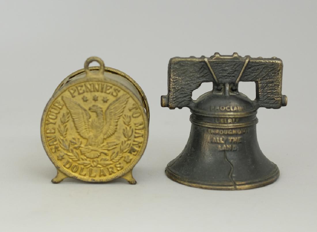 Liberty Bell with Yoke / Gold Dollar Banks: Made by Arcade circa 1920's. Made of Cast Iron and Steel. Both 3 1/2" Tall. Very Fine to Excellent Condition.