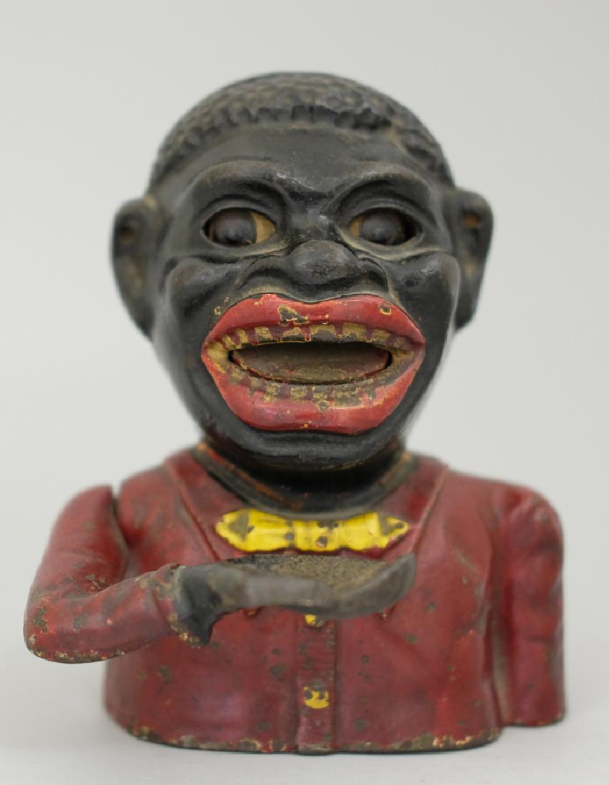 Jolly N. Straight Letters Mechanical Bank: Made in England circa 1920's. Made of Cast Iron. A scarce bank. Excellent Condition (Missing Baseplate).