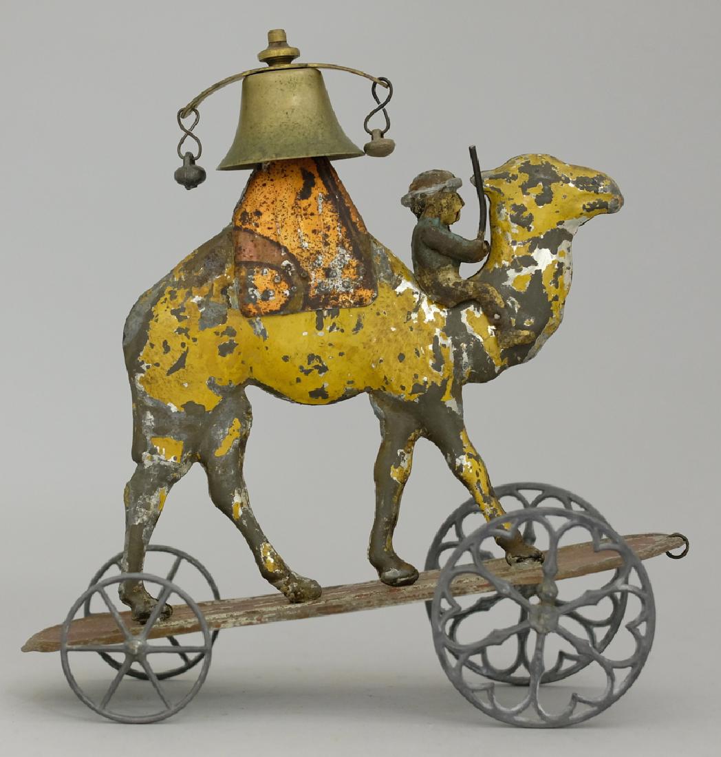 Camel Bell Toy: Made by Altoph Bergmann. Made of Tin. 9" Long. Good Condition (Some Rust).