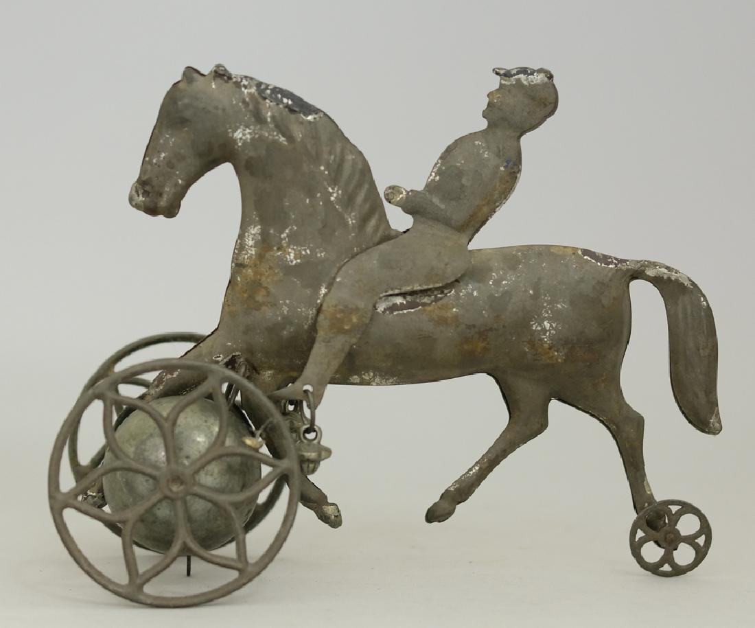 Jockey Riding Horse Bell Toy (1 of 2)