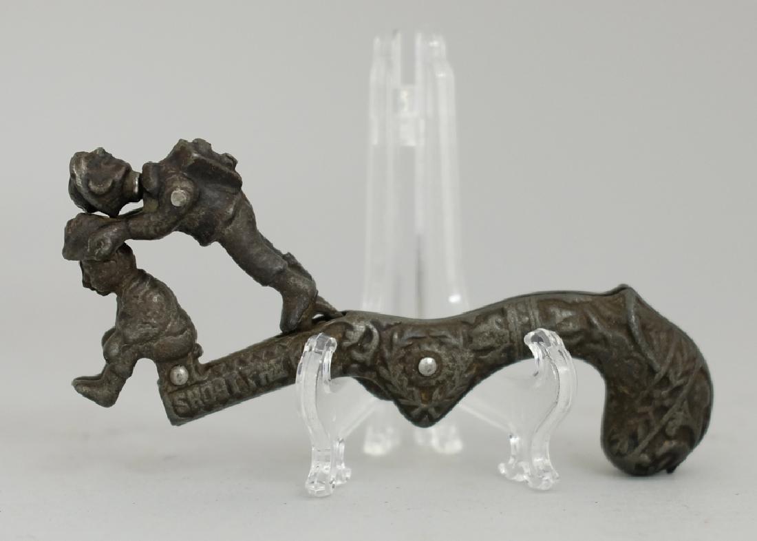 "Shoot the Hat" Cap Gun: Made by Ives, Blakeslee Co. circa 1890's. It is 5" long. Made of Cast Iron. Fine Condition.