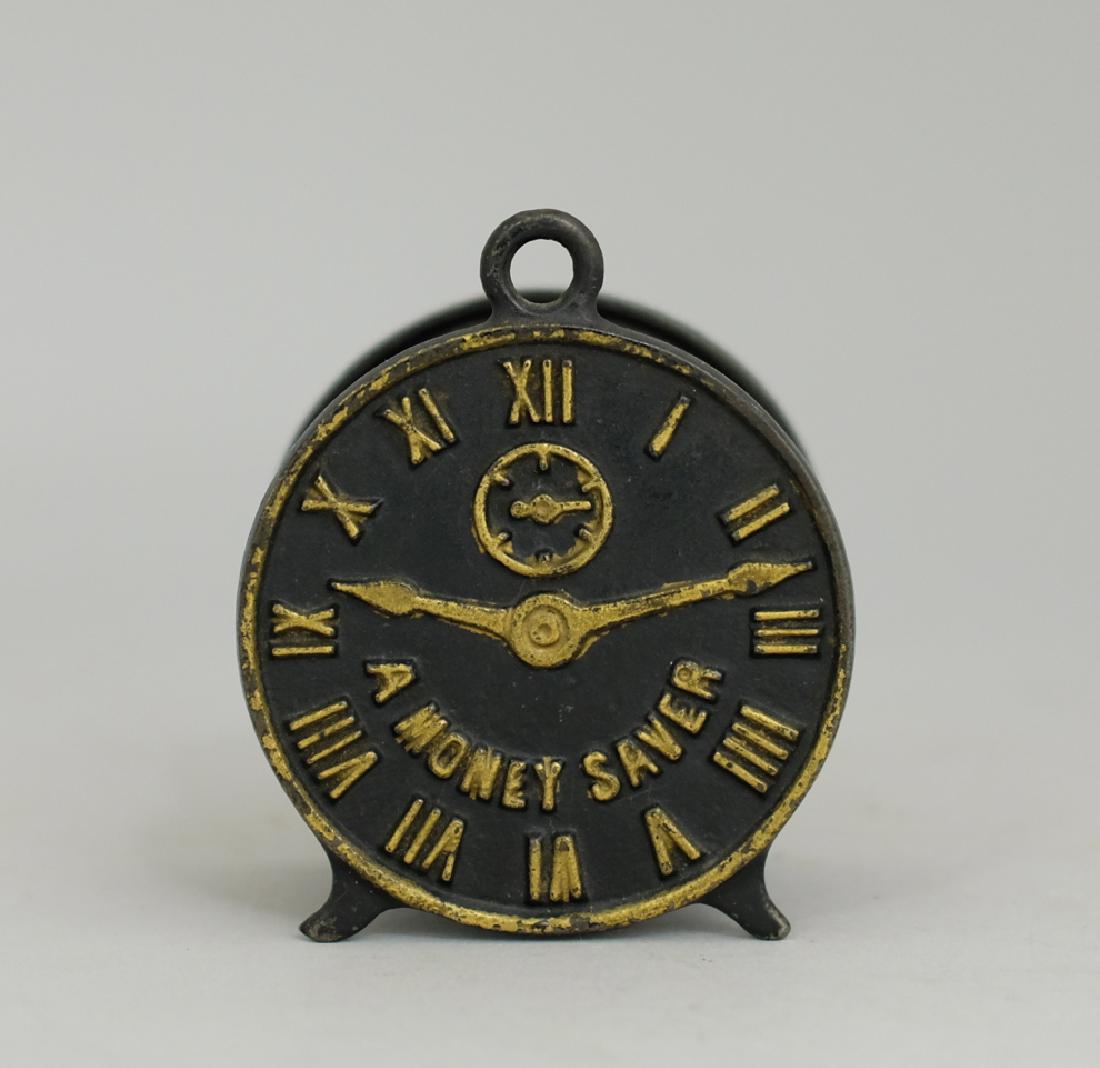 A Money Saver Clock Iron Bank (1 of 2)
