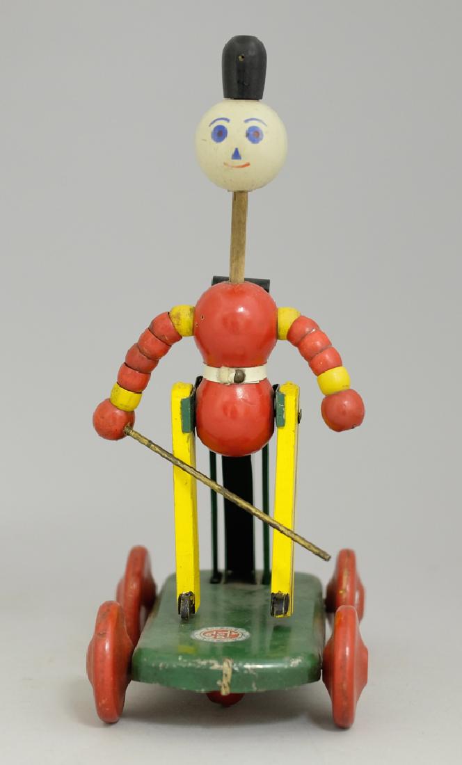 Ted Toys Marching Soldier: Made by Ted Toys. Made of Wood and Tin. 9.5" Tall. Fine Condition.
