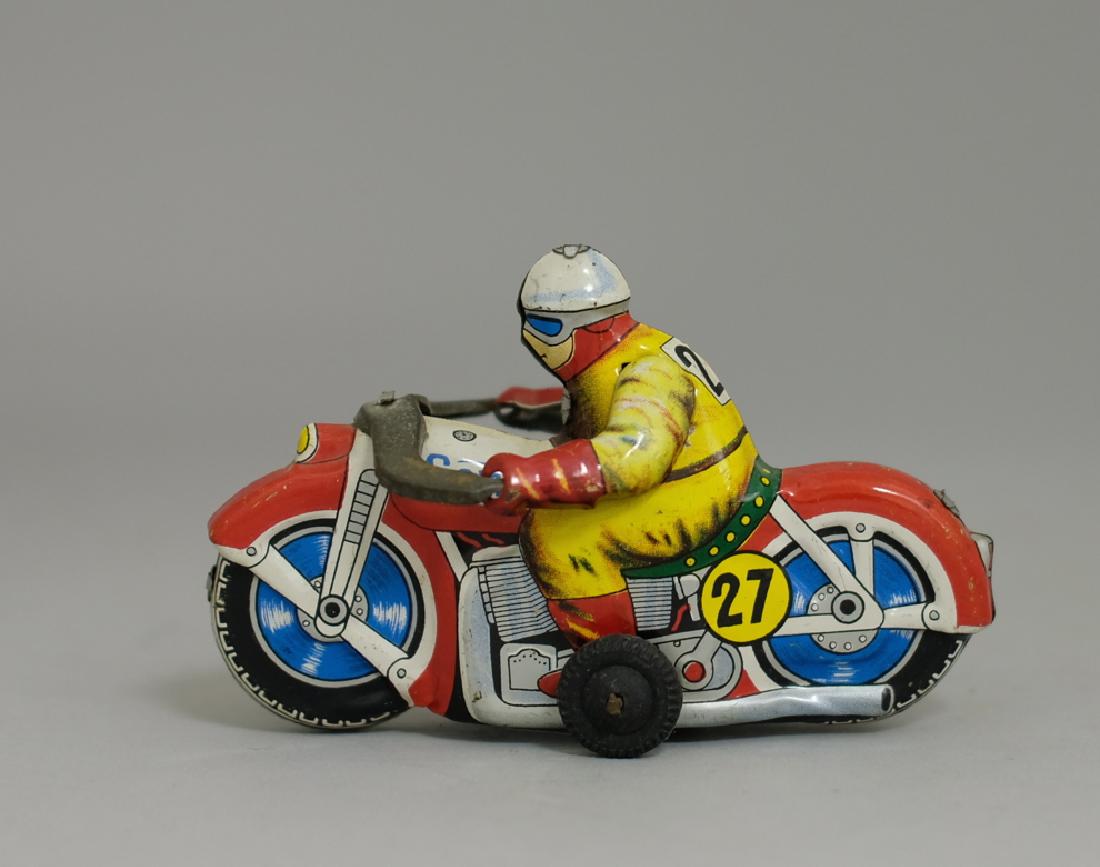Comet Motorcycle: Made in Japan circa 1950's. Made of Tin.