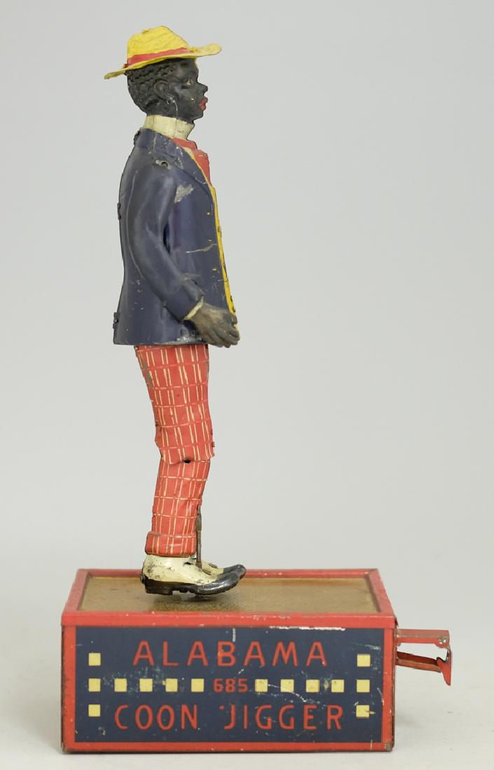 Lehmann Alabama Coon Jigger: Made by Ernst Paul Lehmann of Germany. Made of Tin. Overall Fine Condition (Works Sluggishly, One Arm held on with string).