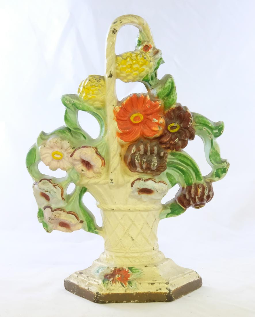 Basket of Flowers Doorstop: Made by Hubley. 9 1/2" Tall. Made of Cast Iron. Excellent Condition.