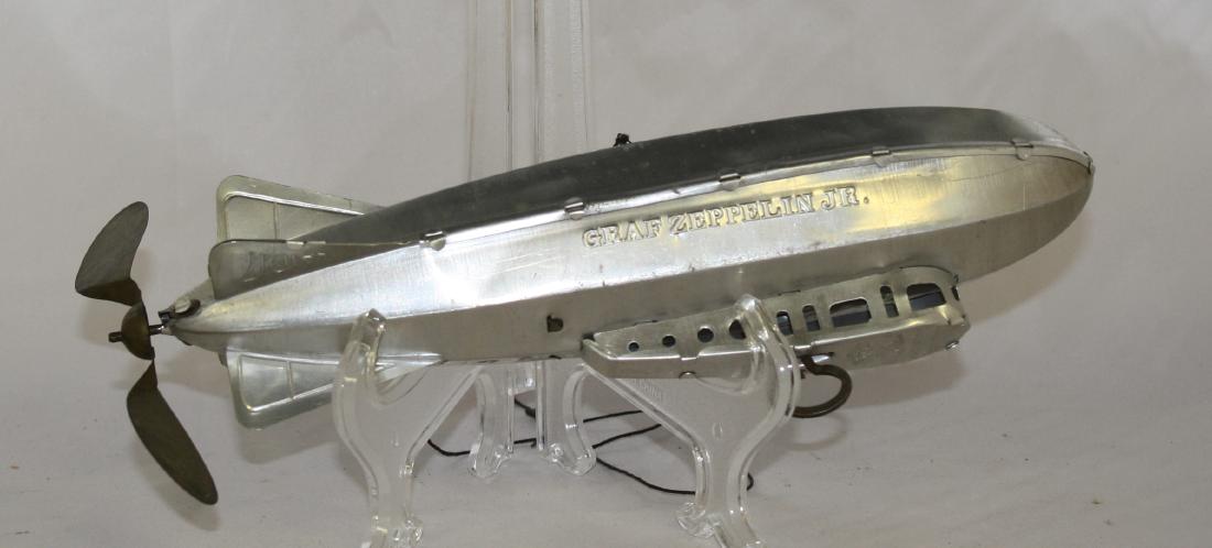 Graf Zeppelin Jr.: Made by Ferdinand Strauss. 10" Long. Made of Tin. Presently does not work properly. Excellent Condition.