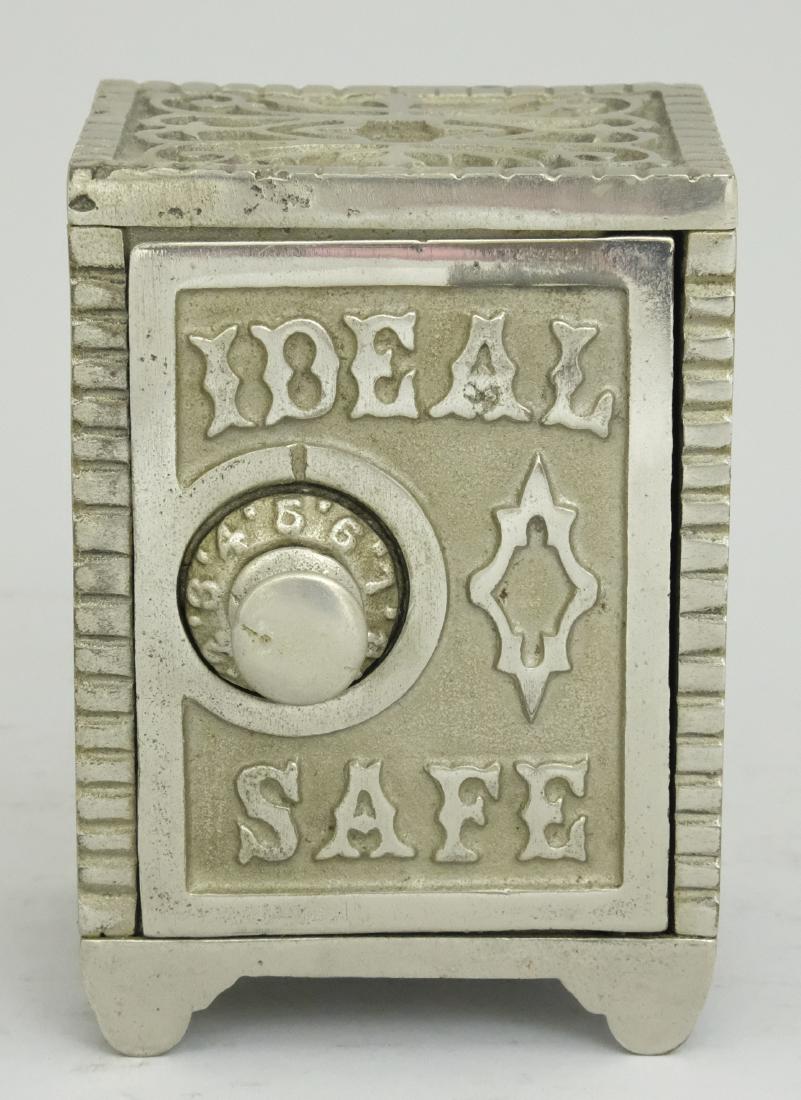 Ideal Safe Cast Iron Bank: Manufactured by Mudd circa 1900's. Made of Cast Iron. 4 5/8" Tall. Excellent Condition.