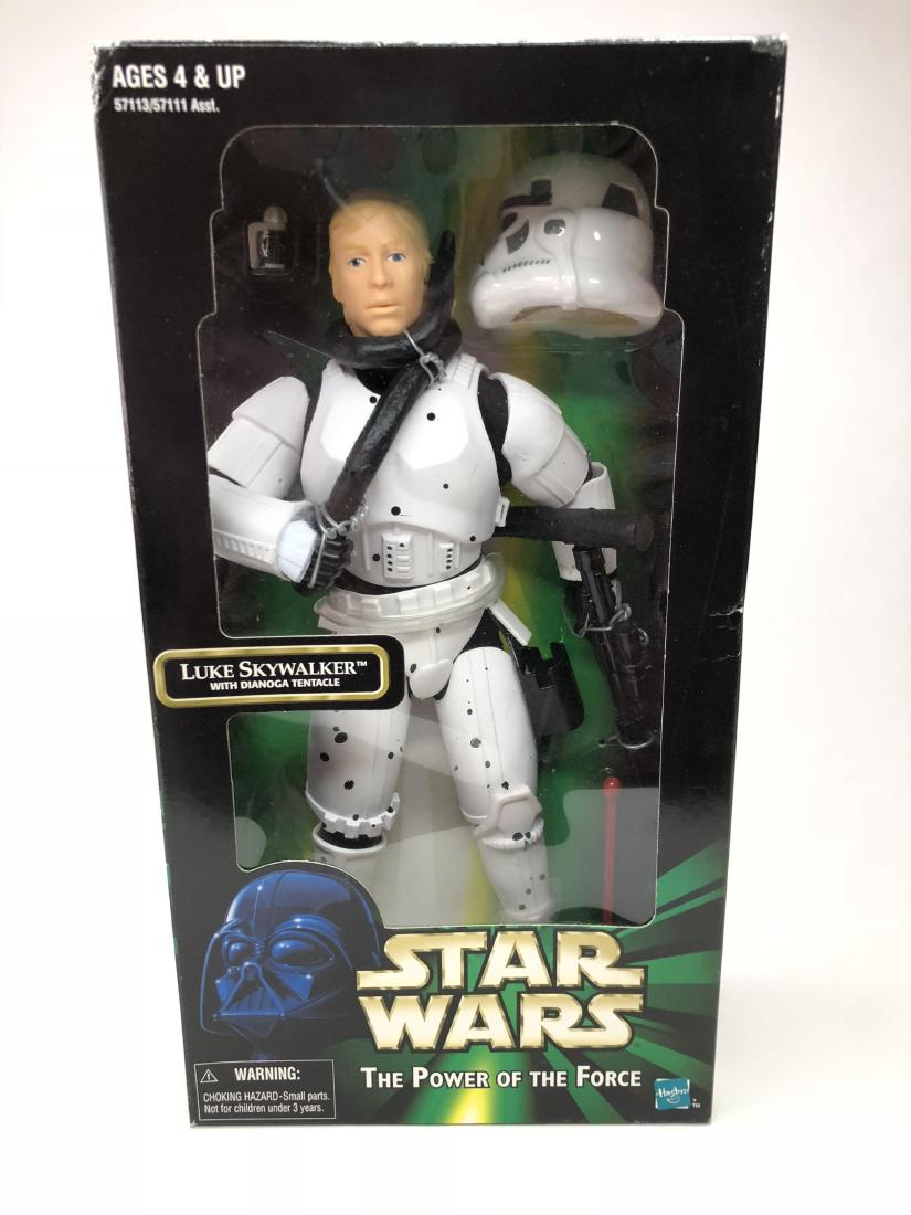 Star Wars Luke Skywalker with Dianoga Tentacle: Action Figure. Made by Hasbro. Asst. 5713/57111. Made in China. Circa 1998. Measures 11 inches in height. Condition Figure Excellent. Condition Box Excellent.