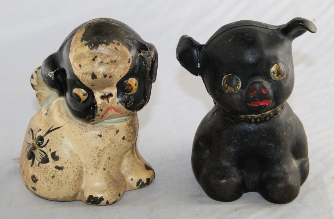 Puppo & Fido Cast Iron Still Banks: Made by Hubley Toy Company circa 1920's. 4 7/8" to 5" T. Both made of Cast Iron. Very Good Condition.