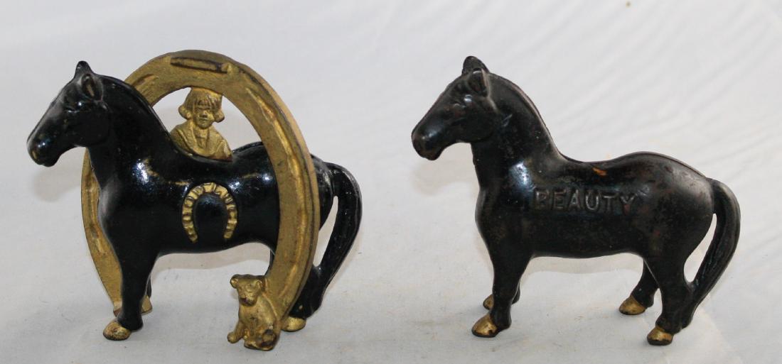 Beauty and Good Luck Horse Shoe Iron Still Banks (1 of 2)