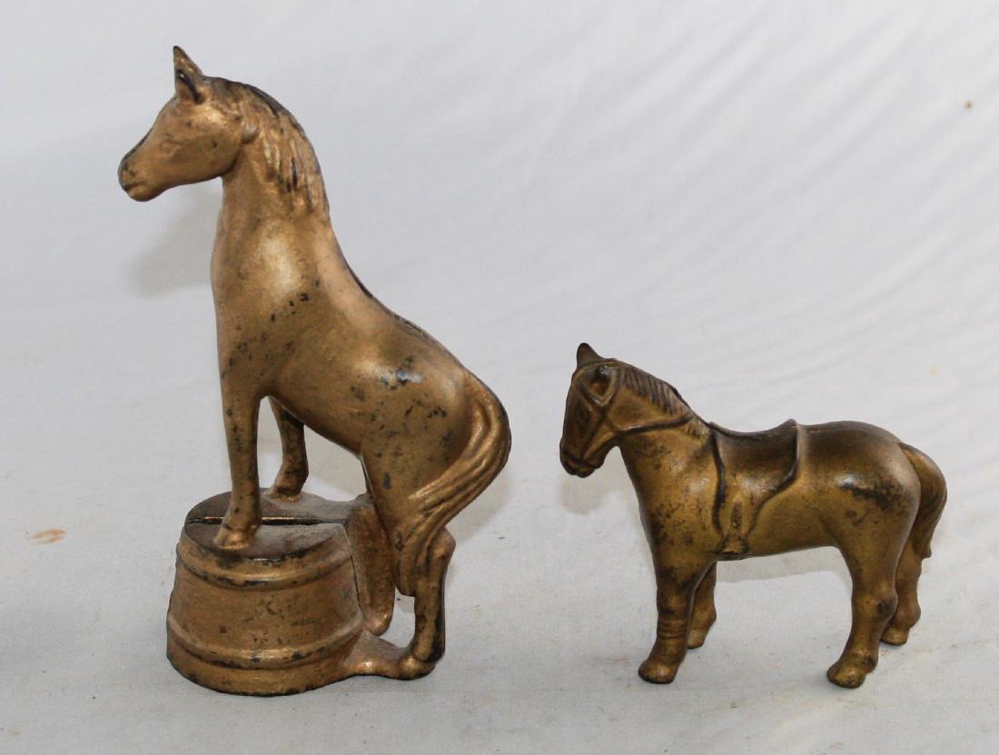 Horse on Tub & Saddle Horse Iron Still Banks (1 of 1)