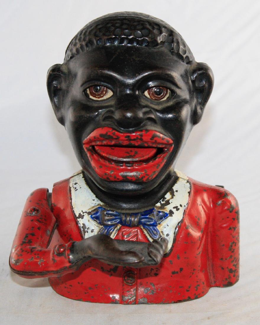 Jolly N Butterfly Tie Cast Iron Mechanical Bank (1 of 2)