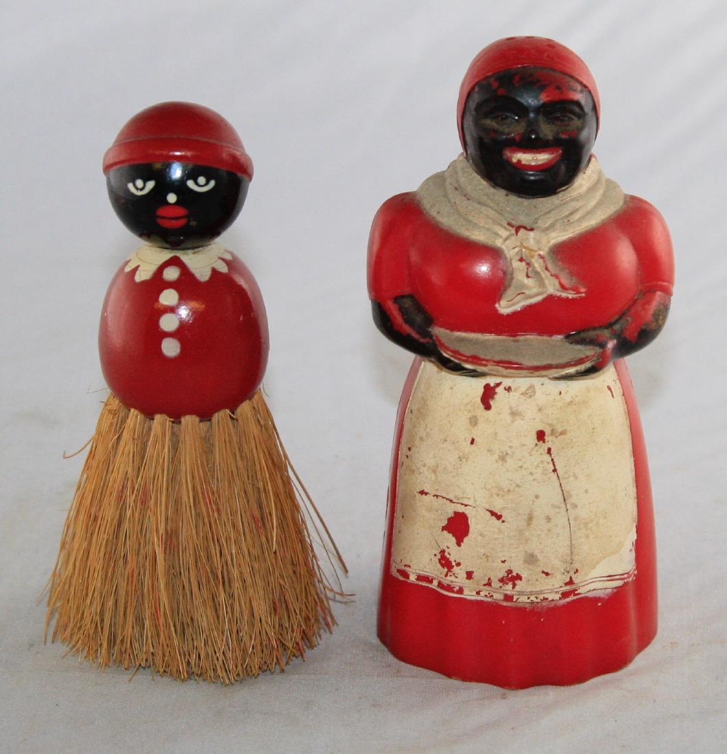 Two Black Themed Figures: Includes a Mammy Salt or Pepper Shaker and a Mammy Brush. The shaker is marked "F. & F. Mold & Die Works Dayton, Ohio". Made of plastic and Wood. Fine to Excellent Condition.