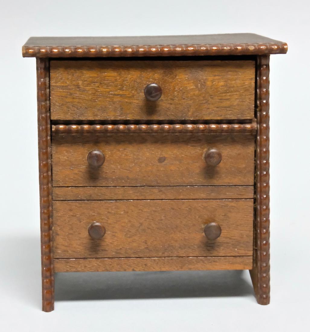 Serrill Patent Bureau Trick Drawer Bank: Made by James A. Serrill circa 1870's of Philadelphia, Pennsylvania. Uses a trick drawer function to deposit your coin (Now You See It, Now You Don't). Made of Wood. Works well. Pristine Condition.
