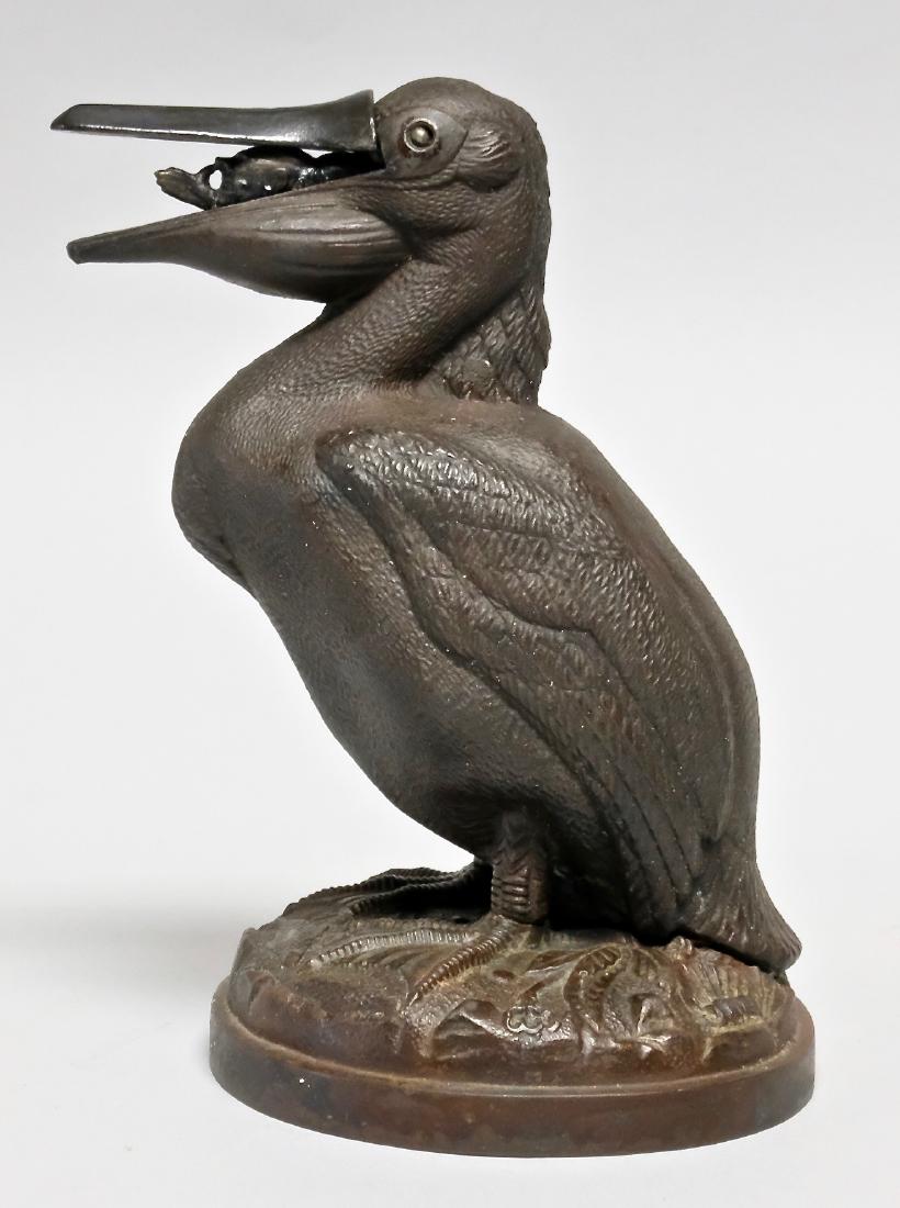 Cast Iron Pelican, Man Thumbs Nose Bank (1 of 2)