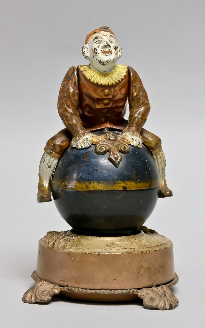 Cast Iron Clown on Globe Mechanical Bank (1 of 3)