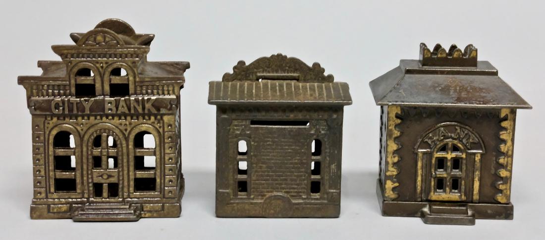 Crown, City and 1876 Cast Iron Still Banks (1 of 4)