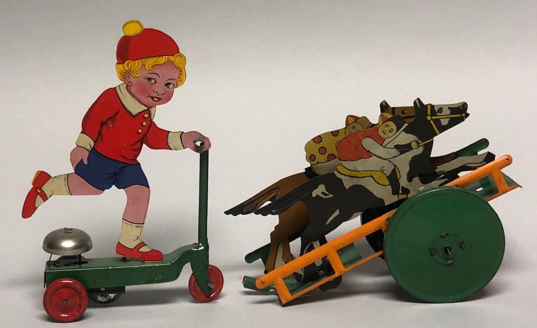 Windup Boy on Scooter and Stick Toy Horse Race (1 of 2)