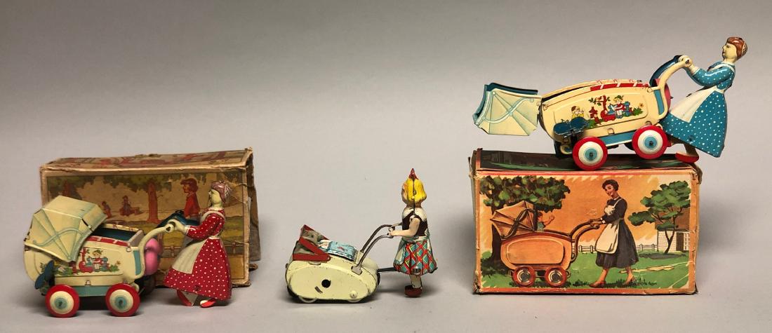 Three Windup Women Pushing Baby Carriages (1 of 2)