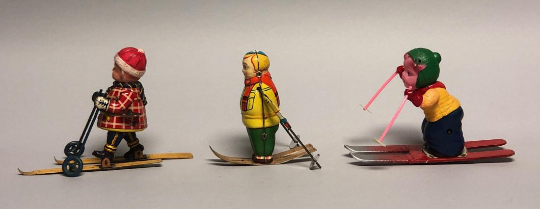 Three Windup Tin and Celluloid Skier Toys (1 of 2)