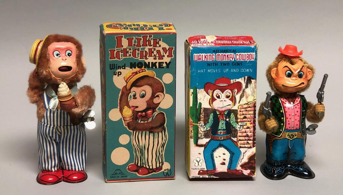Tin Wind Up Ice Cream Monkey & Monkey Cowboy: Cowboy Monkey marked "Y" made in Japan. Action: Ice Cream Monkey raises his ice cream cone to his mouth and sticks his tongue out. Monkey Cowboy slowly moves forward and waves his gun, causing a "shoo
