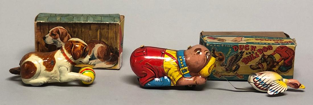 Two Tin Made in Japan Dog Themed Toys (1 of 2)