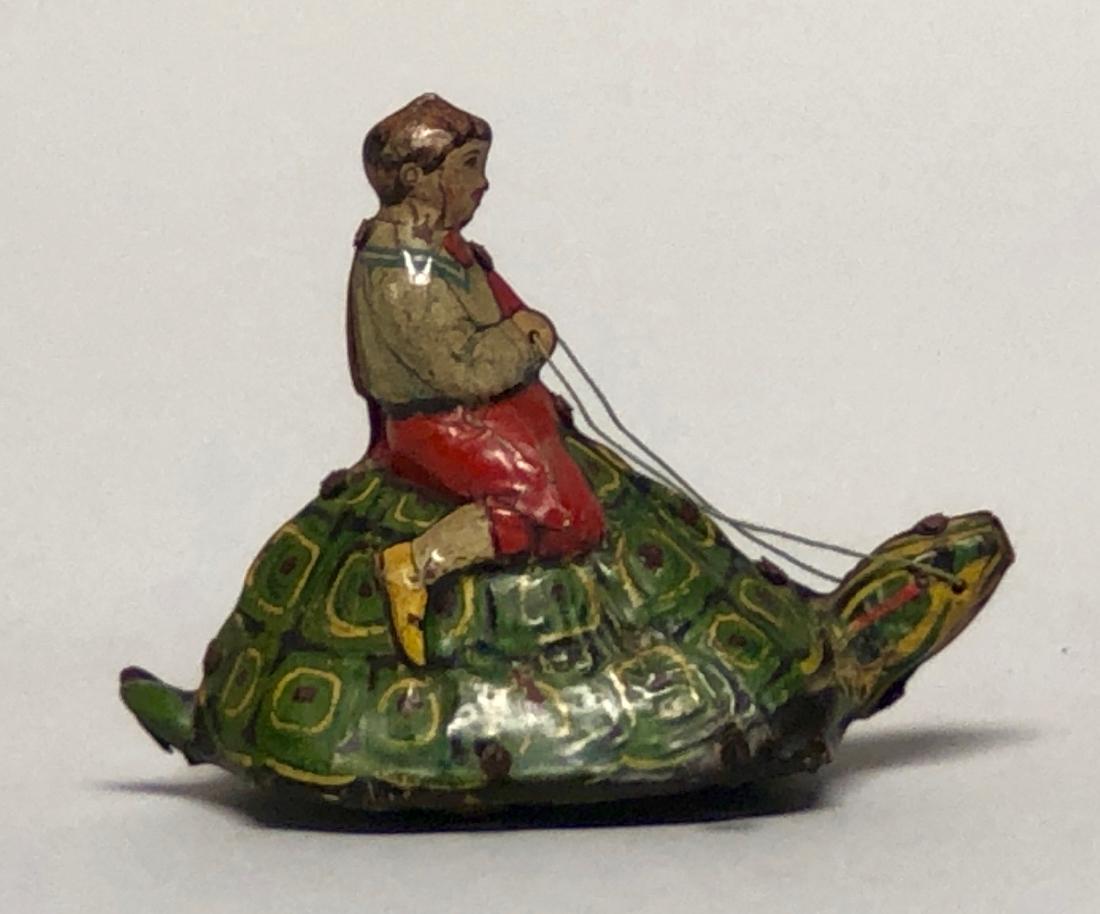 German Tin Windup Boy Riding Turtle (1 of 2)