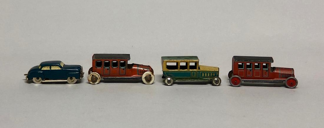Four Penny Toy Vehicles (1 of 2)