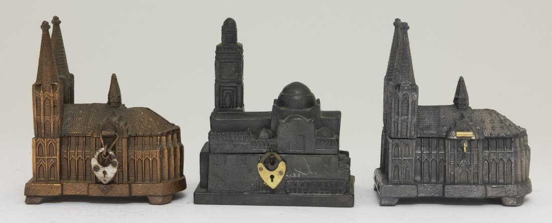 Three Lead Souvenir Still Banks (1 of 2)