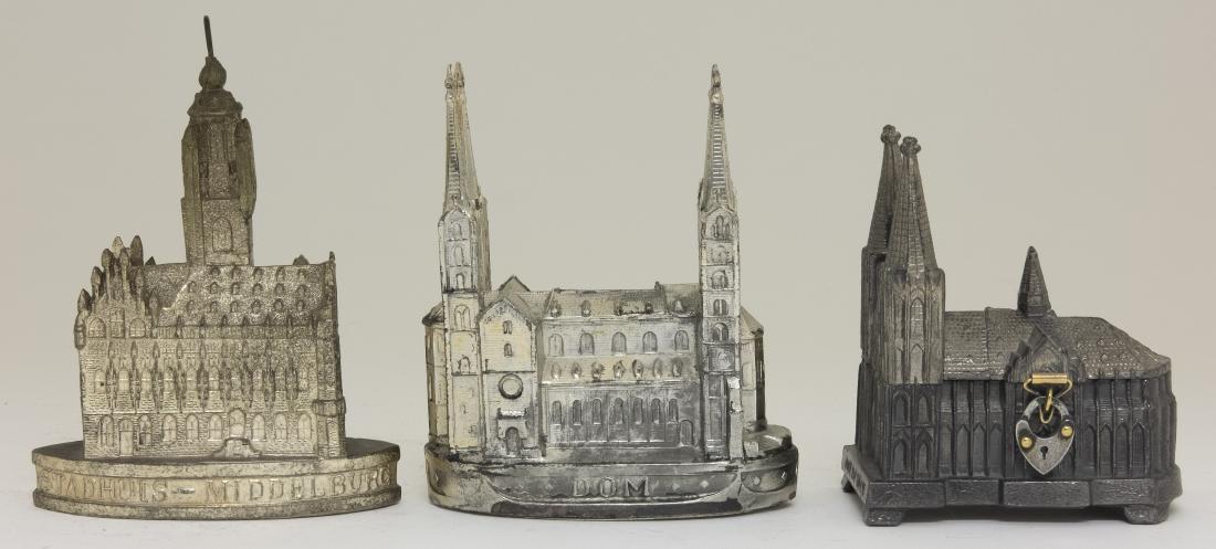 Three Lead Souvenir Still Banks (1 of 2)