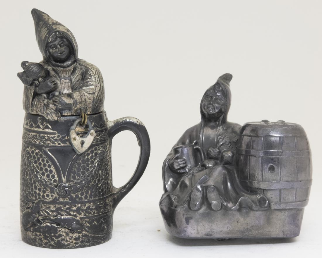 Two Silvered Lead Munich Girl Still Banks (1 of 2)