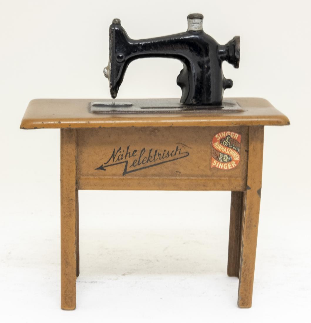 Singer Sewing Machine Tin Still Bank (1 of 2)