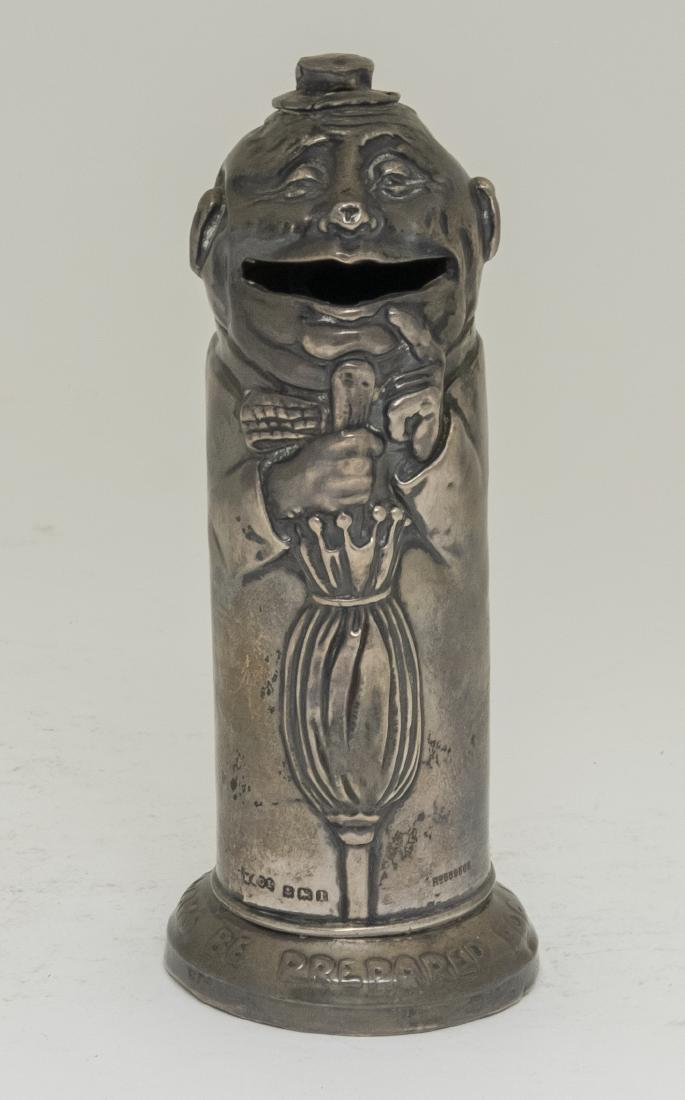 Cylindrical Silvered Tin Man with Umbrella Bank: Made in Germany circa 1920's. 5 3/4" T. Made of Silvered Tin. Fine Condition.