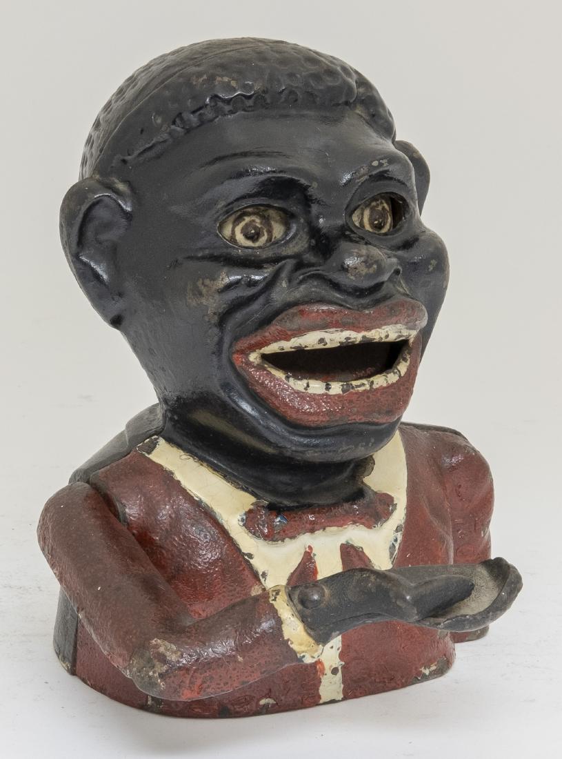 Jolly N. Cast Iron Mechanical Bank: Made in England. Made of Cast Iron. Very Fine Condition.