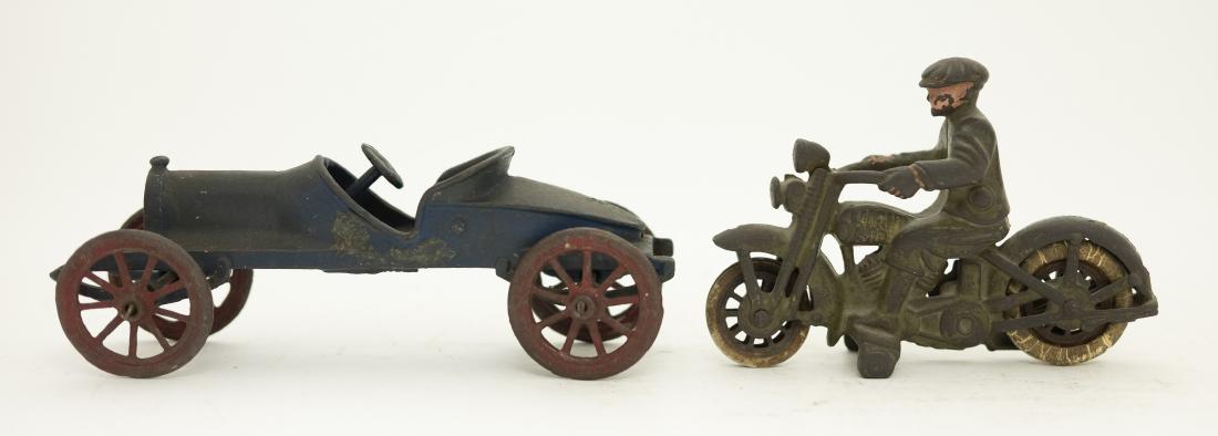 Hubley Harley Davidson & Race Car Iron Toys: Made by Hubley. 6" - 8" L. Made of Cast Iron. Good to Fine Condition. Motorcycle missing front wheel. Race Car missing driver.